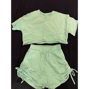 Two piece set blue size XS women’s cropped top tee and shorts